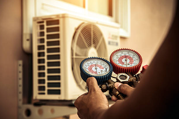 Professional Heat Pump Repair technician working in Isleta, NM